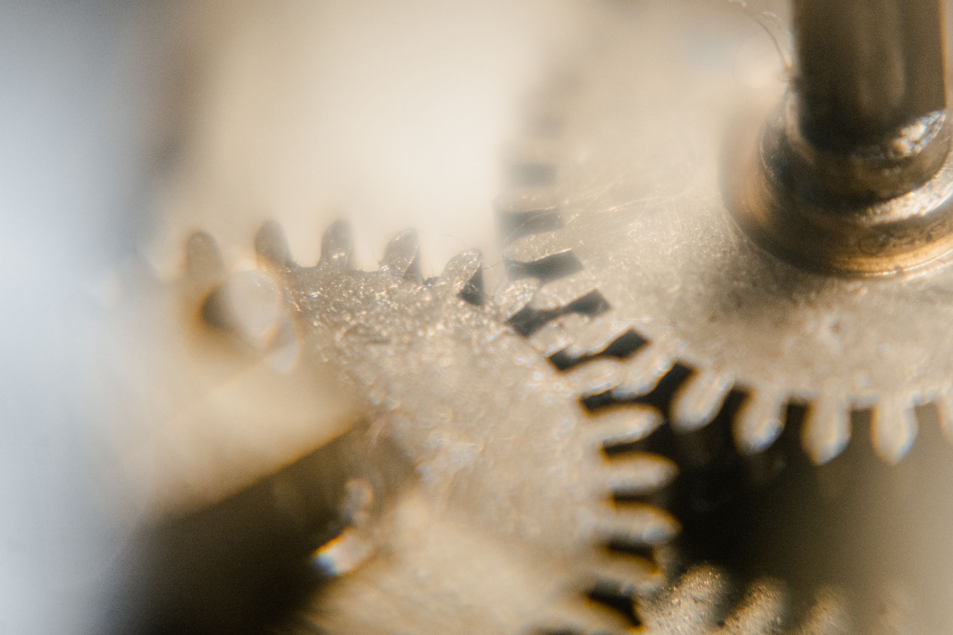 the gears inside an old mechanical clock